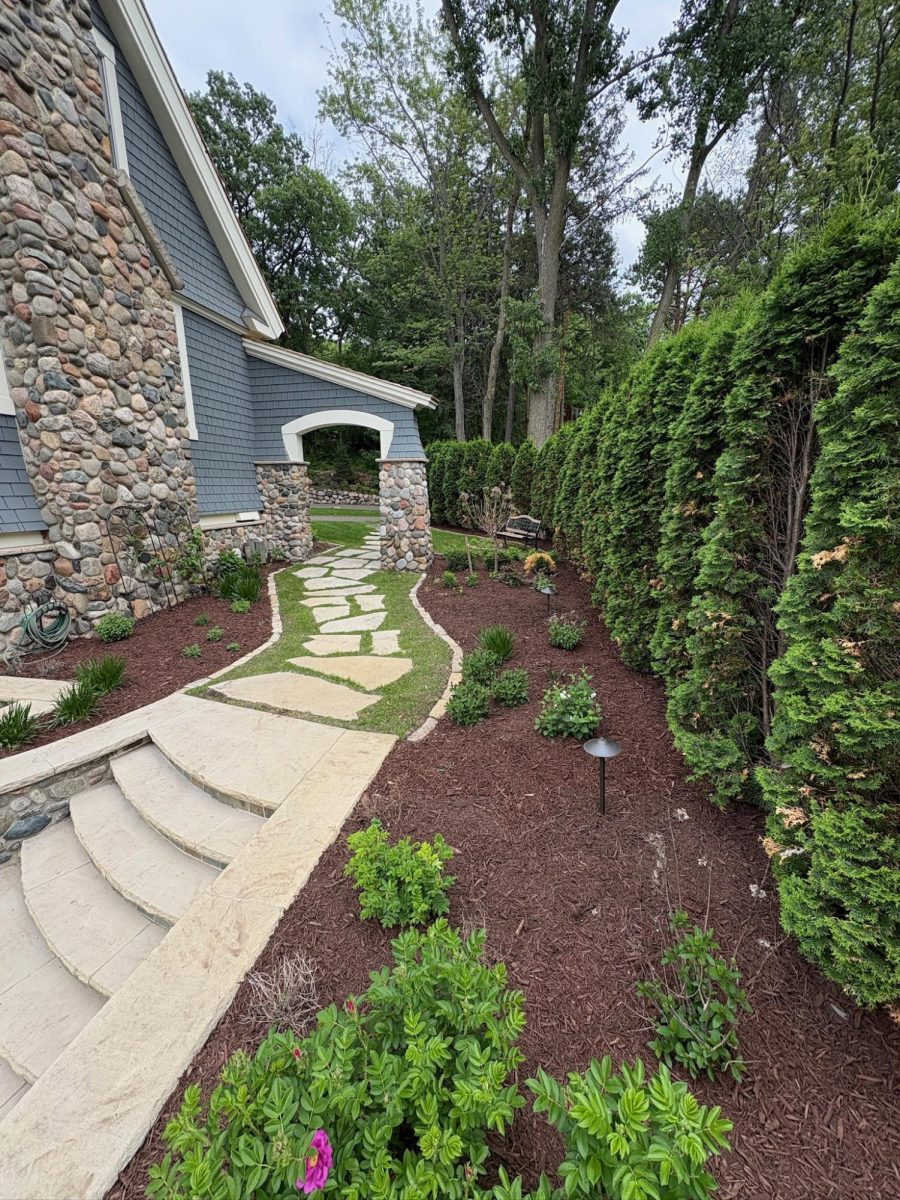 Brown mulch adds a warm, clean look to any yard and really makes the plants and landscaping pop. It gives the beds a fresh contrast while helping the whole property look more polished and maintained.
